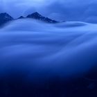 Mraky tečou přes Grimselpass | fotografie